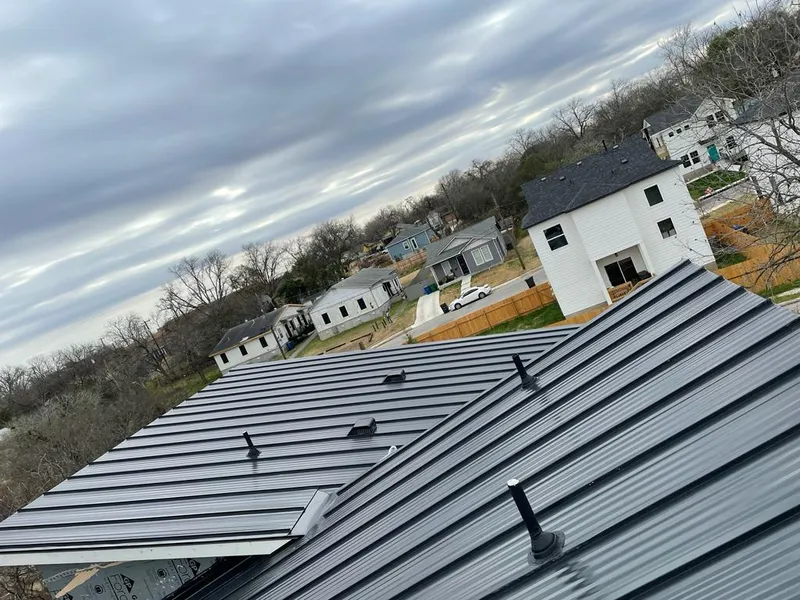 Standing seam metal roof panels with vents for Skylight Repair in Elmsford